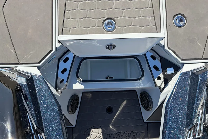Slide: The Image of 2026 Ranger Z521R Cup-Equipped boat interior with open storage compartment and sleek design. - 35
