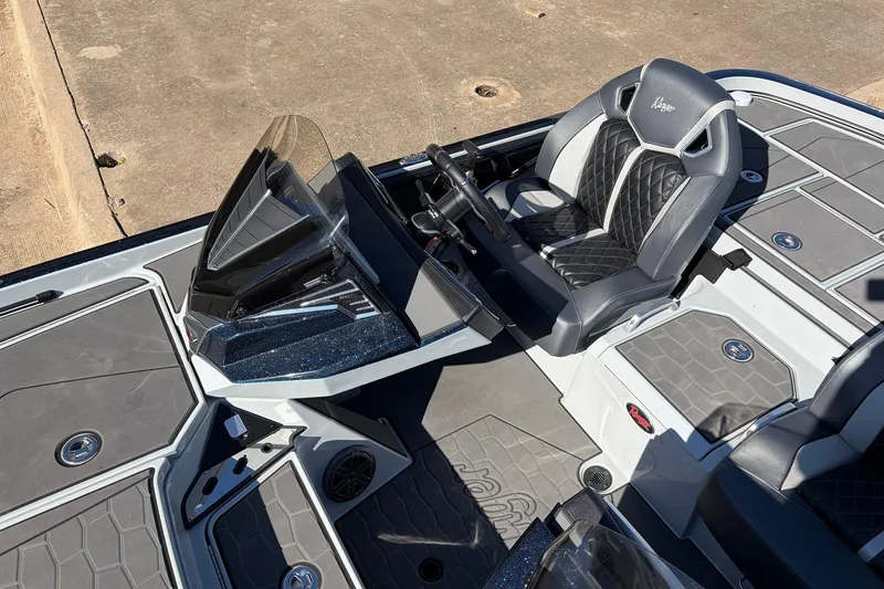 Slide: The Image of 2026 Ranger Z521R Cup-Equipped boat interior with sleek seating and modern dashboard design. - 37
