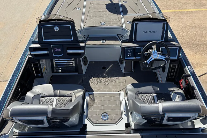 Slide: The Image of 2026 Ranger Z521R Cup-Equipped boat interior with Garmin electronics and luxury seating. - 39