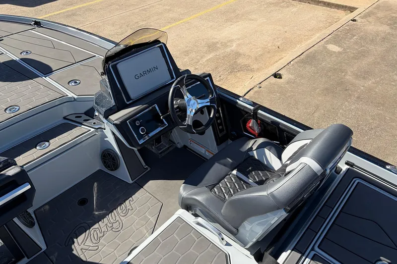 Slide: The Image of 2026 Ranger Z521R Cup-Equipped boat interior with Garmin display and sleek seating. - 44