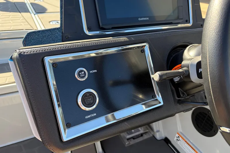 Slide: The Image of 2026 Ranger Z521R Cup-Equipped dashboard with ignition and horn controls. - 47