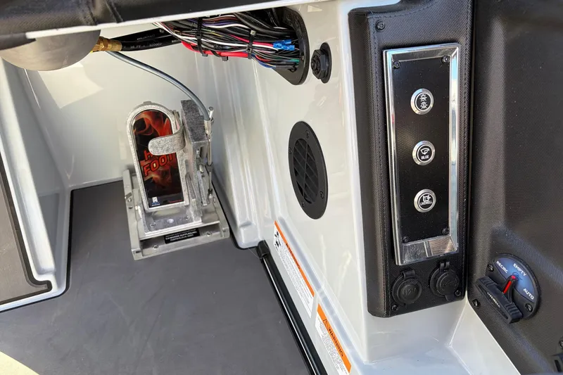 Slide: The Image of Interior view of 2026 Ranger Z521R Cup-Equipped boat with control panel and wiring. - 56