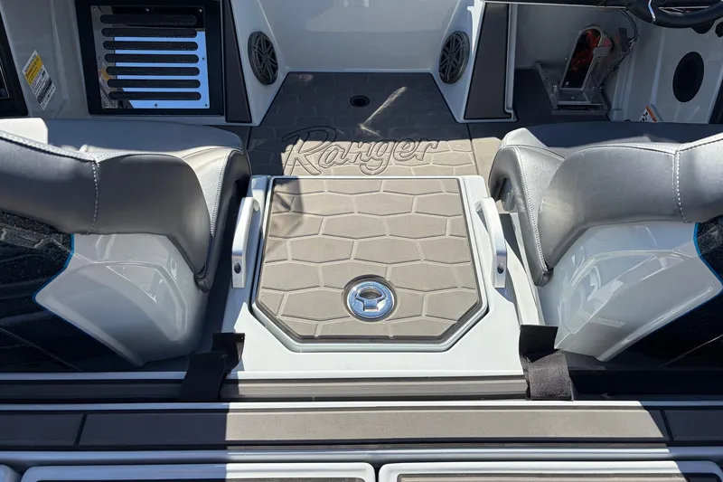 Slide: The Image of 2026 Ranger Z521R Cup-Equipped boat interior with gray seating and deck. - 57