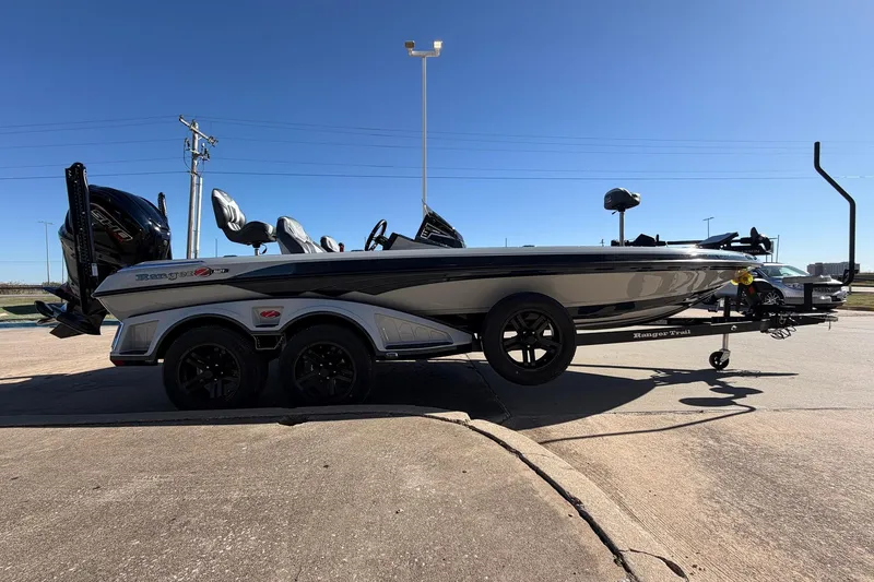 Slide: The Image of 2026 Ranger Z521R Cup-Equipped boat on trailer, parked outdoors under clear sky. - 6