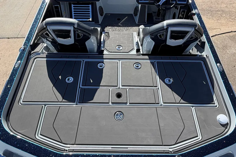 Slide: The Image of 2026 Ranger Z521R Cup-Equipped boat interior with sleek seating and storage compartments. - 61