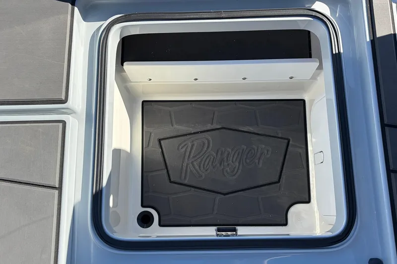 Slide: The Image of 2026 Ranger Z521R Cup-Equipped boat storage compartment with branded mat. - 68