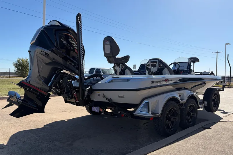 Slide: The Image of 2026 Ranger Z521R Cup-Equipped boat with Yamaha engine, parked on a sunny day. - 7