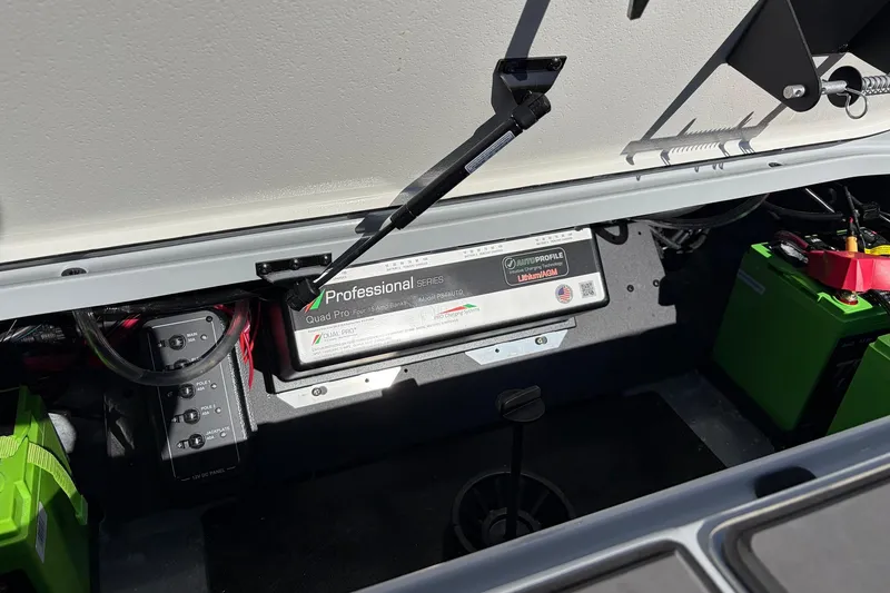 Slide: The Image of 2026 Ranger Z521R Cup-Equipped boat battery compartment with Professional Series charger. - 73