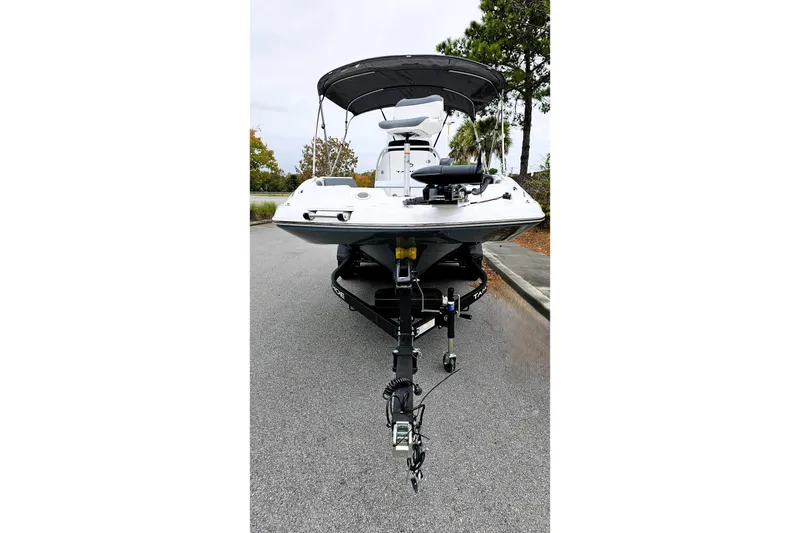 Slide: The Image of 2026 Tahoe 2150 CC boat cockpit with modern steering and navigation systems. - 6