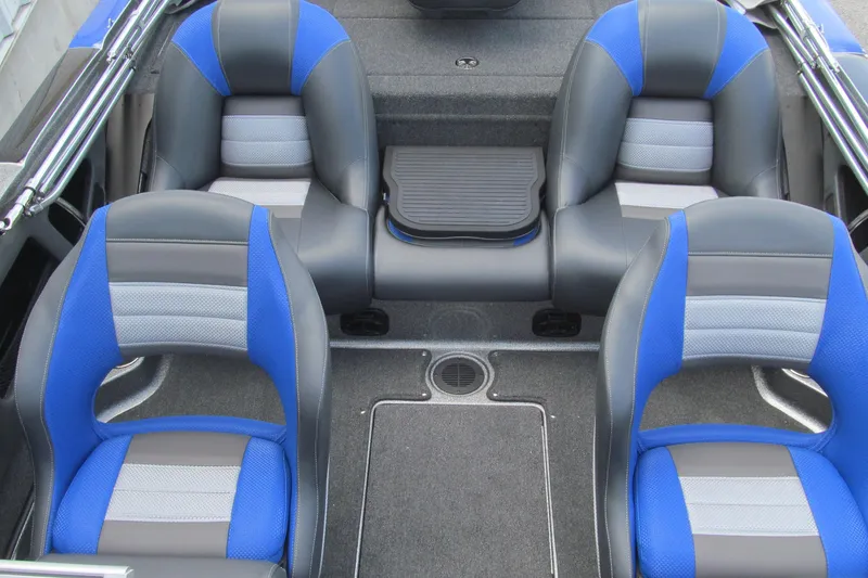 Slide: The Image of 2026 Ranger 212LS boat interior with blue and gray seating arrangement. - 12