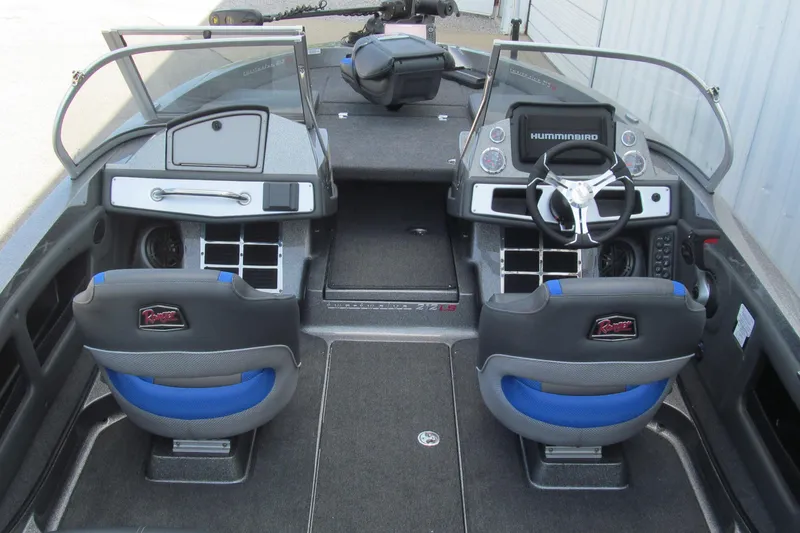 Slide: The Image of Interior of a 2026 Ranger 212LS boat with dual seats and advanced dashboard controls. - 4