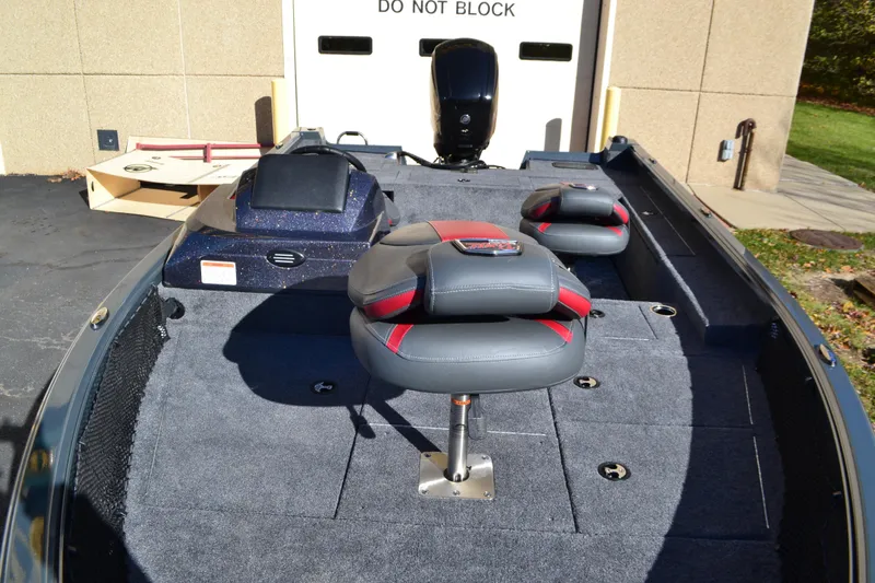 Slide: The Image of 2026 Ranger VS1682SC Reata boat interior with seating and storage compartments. - 3