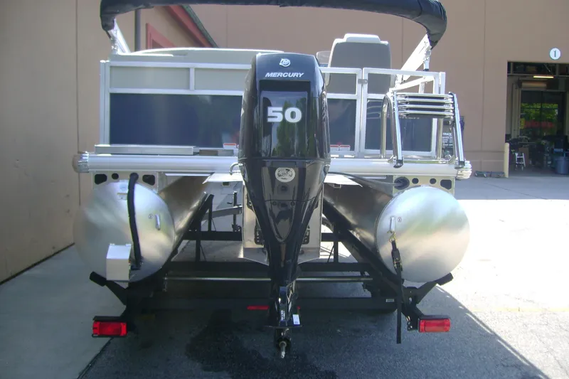 Slide: The Image of 2026 Sun Tracker Bass Buggy 16 XL Select pontoon boat with Mercury 50 outboard motor. - 4