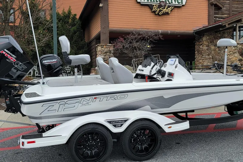 The Image of 2026 Nitro Z19 XL boat with Mercury engine, parked outside White River Fly Shop. - 0
