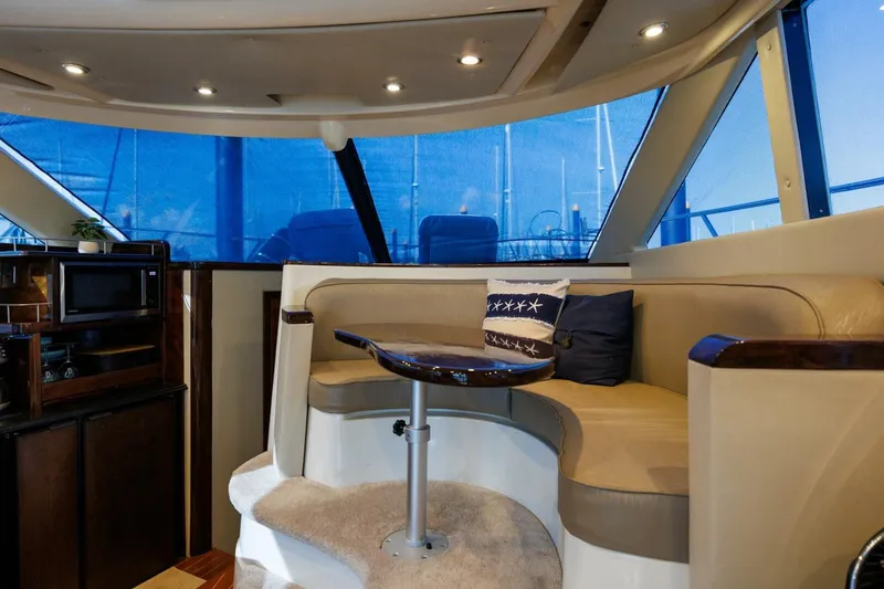 Slide: The Image of Luxurious interior of 2010 Meridian 391 Sedan yacht with cozy seating and elegant decor. - 12