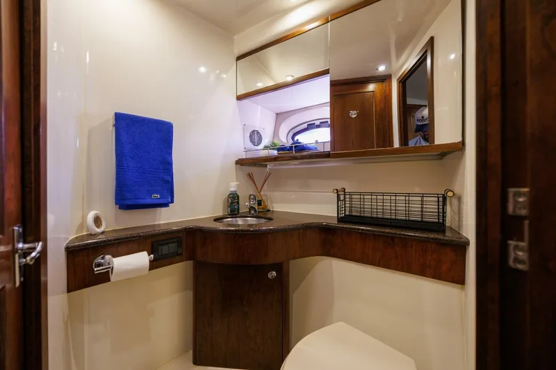 Slide: The Image of Luxurious bathroom in 2010 Meridian 391 Sedan yacht with modern amenities. - 17