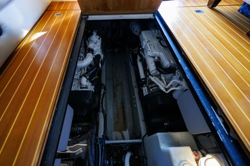 Slide: The Image of Engine compartment of a 2010 Meridian 391 Sedan yacht with wooden flooring. - 35
