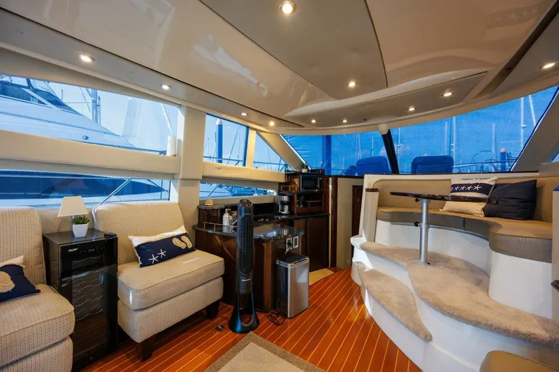 Slide: The Image of Luxurious interior of a 2010 Meridian 391 Sedan yacht with plush seating and modern amenities. - 4