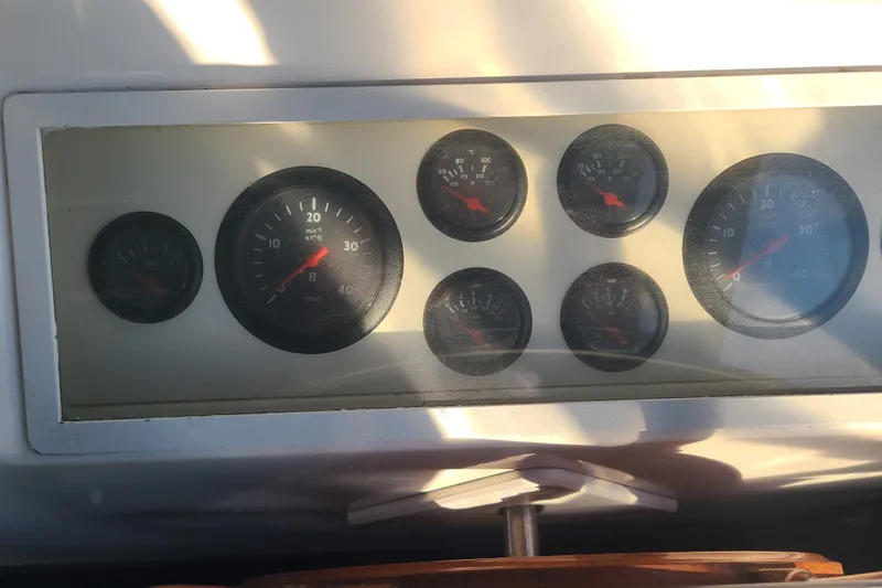 Slide: The Image of Dashboard gauges of a 2000 Grand Banks 46 Classic boat. - 17