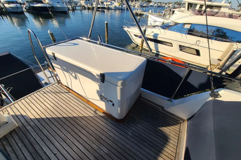 Slide: The Image of Grand Banks 46 Classic yacht deck with storage box, docked at marina, 2000 model. - 20