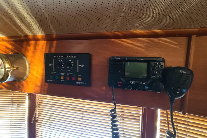 Slide: The Image of Control panel and radio equipment on a 2000 Grand Banks 46 Classic yacht. - 32