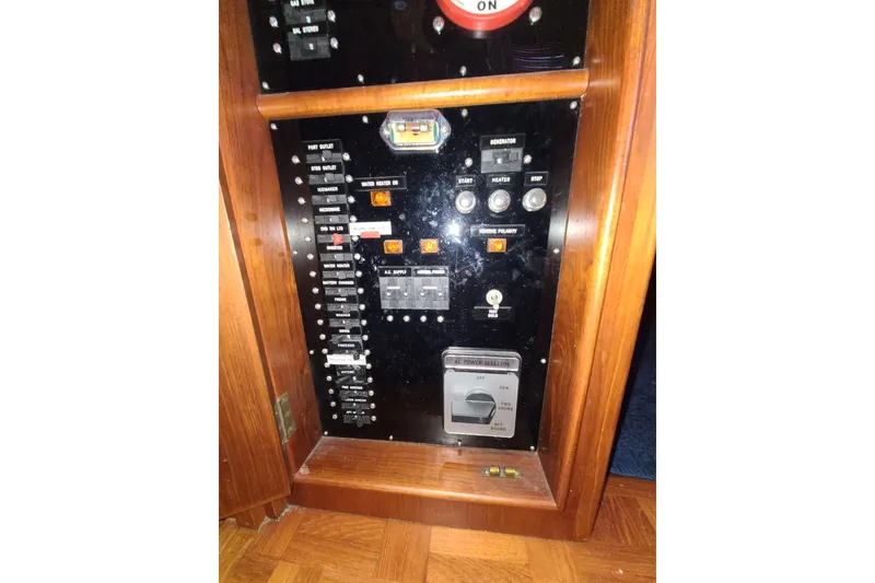 Slide: The Image of Electrical control panel on a 2000 Grand Banks 46 Classic yacht. - 36