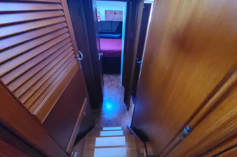 Slide: The Image of Interior view of 2000 Grand Banks 46 Classic yacht cabin hallway. - 46