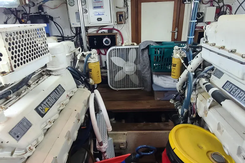 Slide: The Image of Engine room of 2000 Grand Banks 46 Classic with Caterpillar engines and equipment. - 59