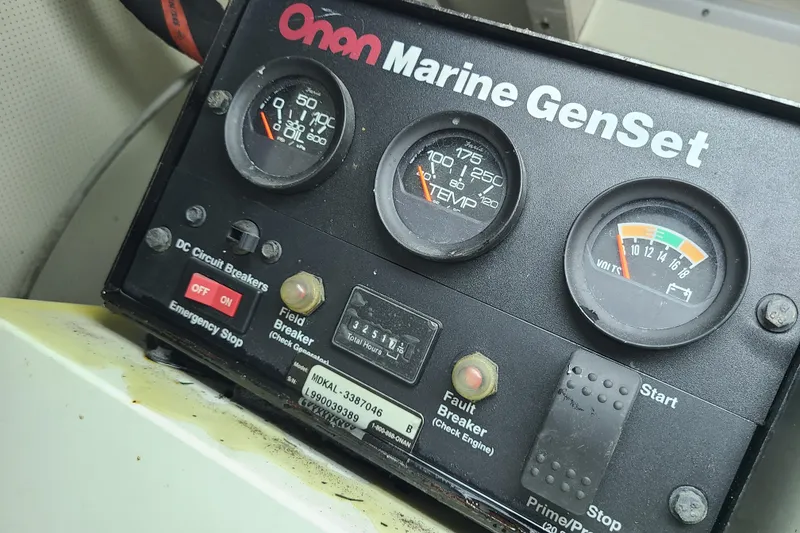 Slide: The Image of Onan Marine GenSet control panel on 2000 Grand Banks 46 Classic yacht. - 61