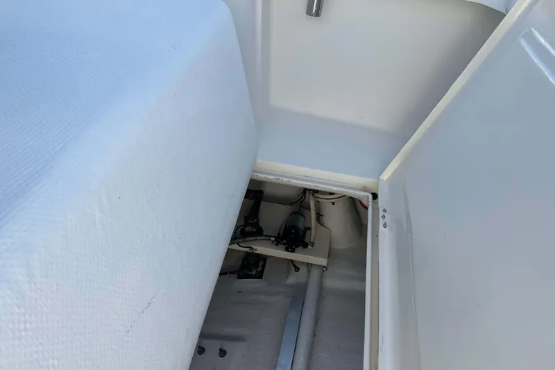 Slide: The Image of 2004 Henriques 35 Express boat interior storage compartment. - 8