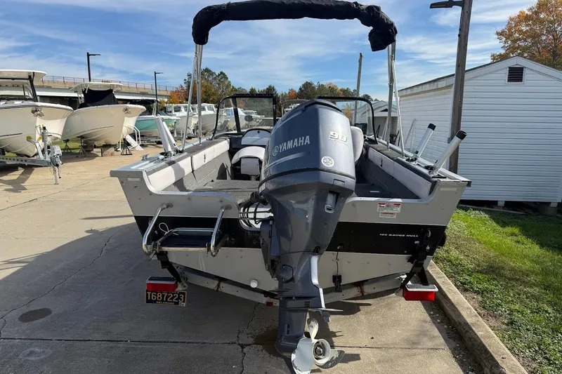 Slide: The Image of Interior of a 2015 Starweld 1700 boat with seating and storage. - 9