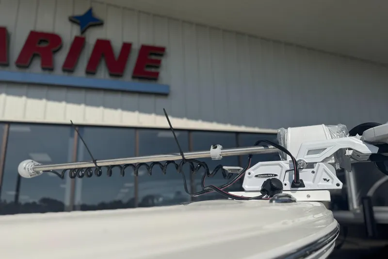 Slide: The Image of 2026 Pathfinder 2500 Hybrid boat with Power-Pole anchor at marine dealership. - 13