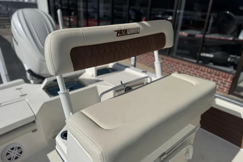 Slide: The Image of 2026 Pathfinder 2500 Hybrid boat seat with brown and cream upholstery. - 18
