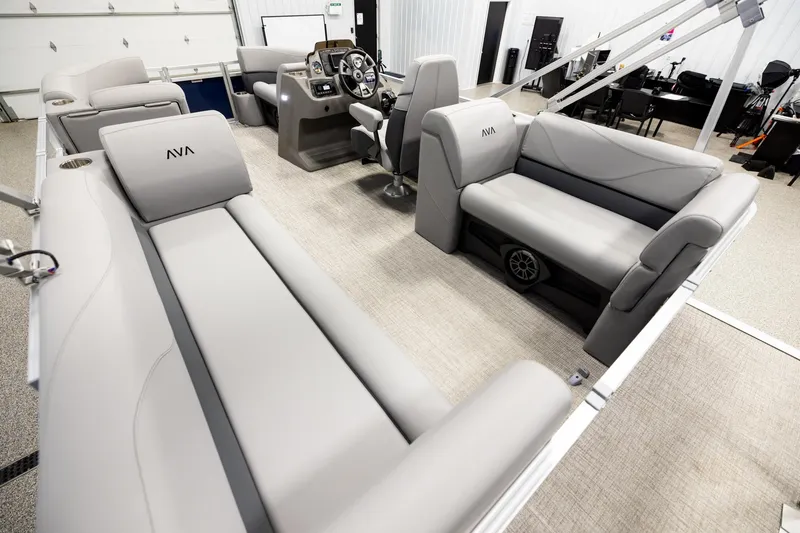 Slide: The Image of Luxurious interior of 2026 Avalon VLS QL pontoon boat with plush seating and modern design. - 11