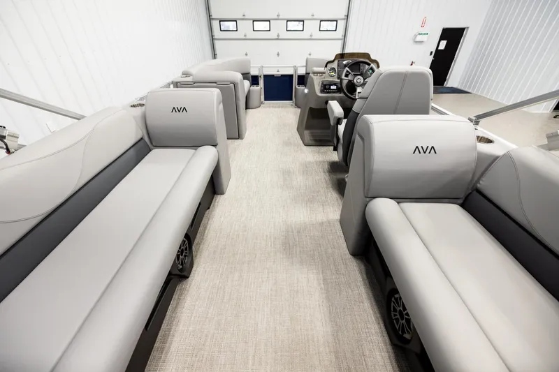 Slide: The Image of Interior of 2026 Avalon VLS QL pontoon boat with gray seating and modern design. - 16