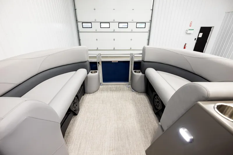 Slide: The Image of 2026 Avalon VLS QL boat interior with modern dashboard and comfortable seating. - 18