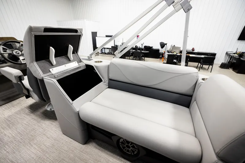 Slide: The Image of Luxurious interior of 2026 Avalon VLS QL boat with plush seating in showroom. - 24