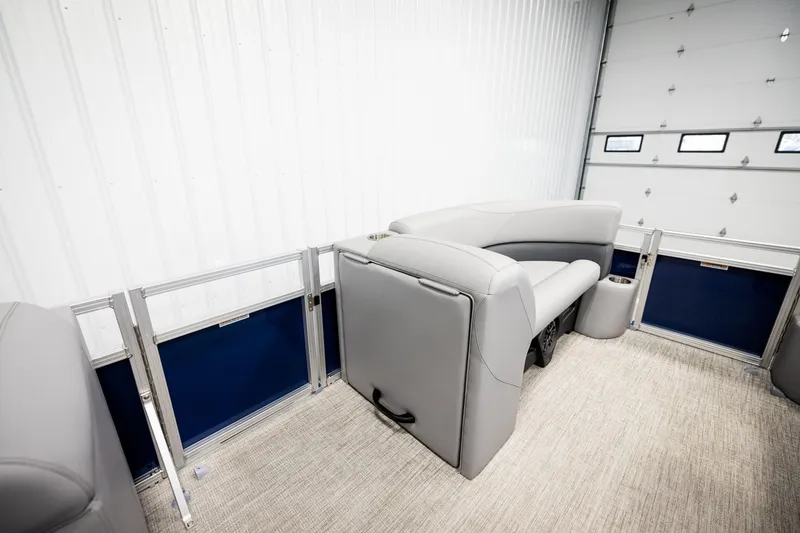 Slide: The Image of 2026 Avalon VLS QL boat interior with modern seating and steering wheel in showroom. - 26