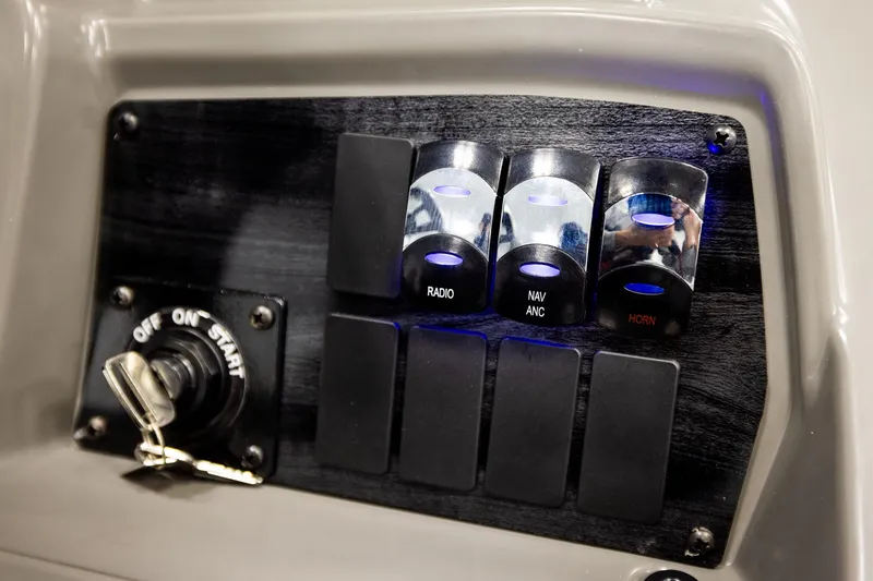 Slide: The Image of Instrument panel of 2026 Avalon VLS QL boat, showing trim and fuel gauges. - 35