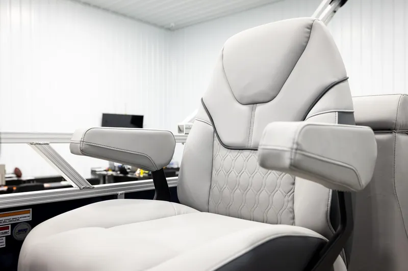 Slide: The Image of Close-up of 2026 Avalon VLS QL throttle control in a marine setting. - 37