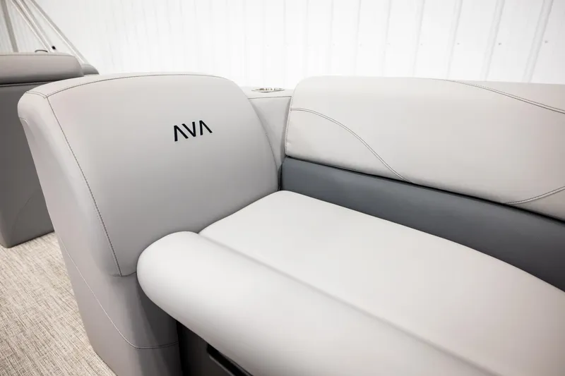 Slide: The Image of Luxurious Avalon VLS QL 2026 boat seat with armrests in showroom setting. - 38