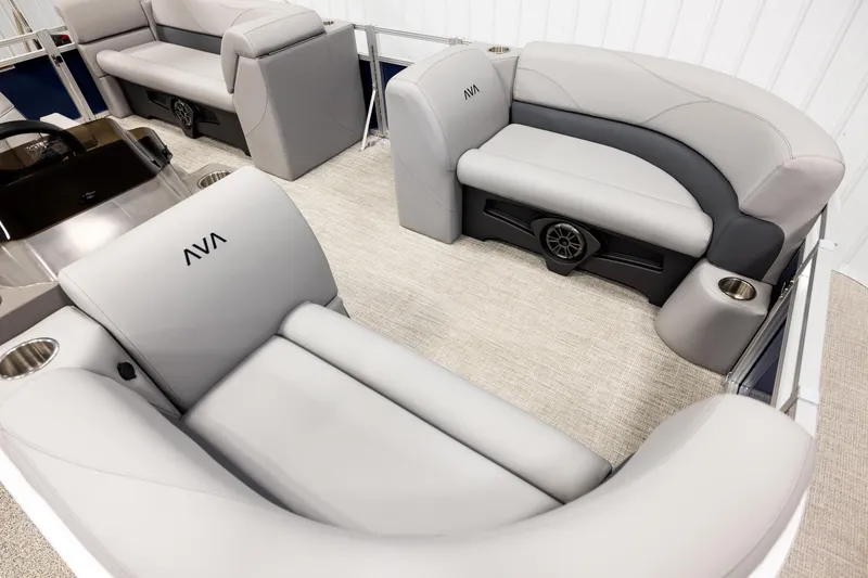 Slide: The Image of 2026 Avalon VLS QL pontoon boat in showroom, featuring sleek design and modern amenities. - 9