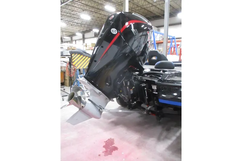 Slide: The Image of 2025 Nitro Z21 XL boat engine in a warehouse setting. - 14