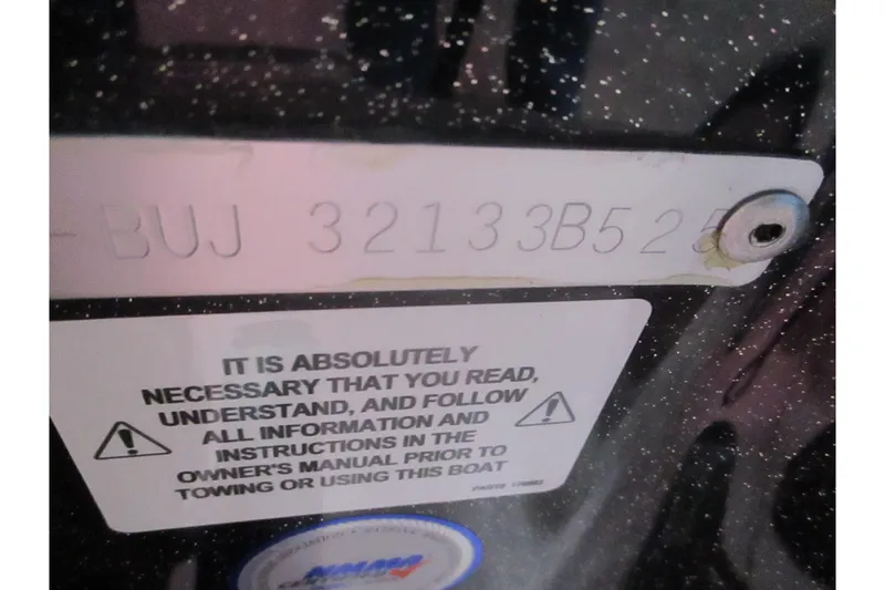 Slide: The Image of 2025 Nitro Z21 XL boat identification plate with safety instructions. - 18