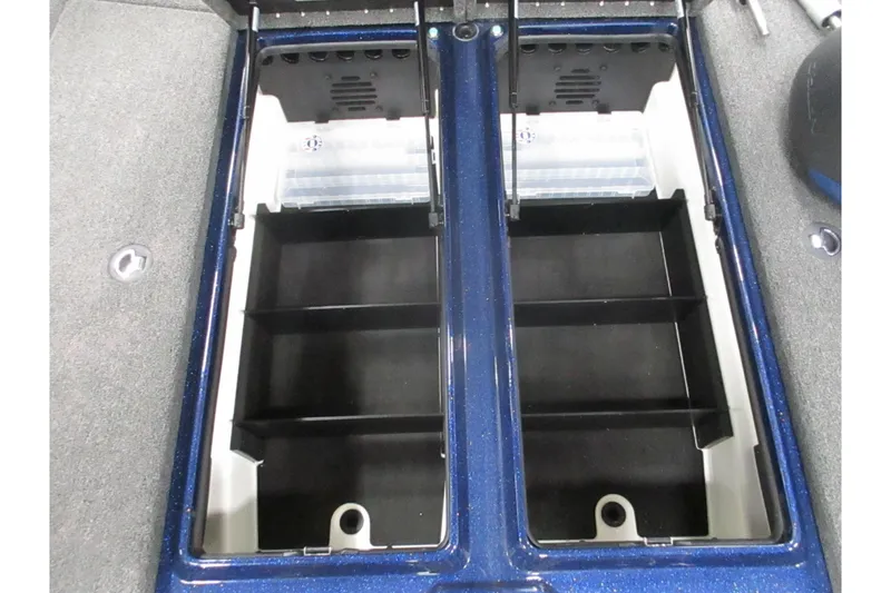 Slide: The Image of 2025 Nitro Z21 XL boat storage compartments with open lids, showcasing interior space. - 7