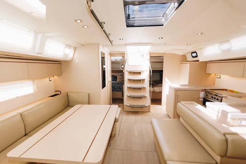 Slide: The Image of Luxurious interior of 2024 Beneteau Oceanis 51.1 yacht, featuring elegant seating and modern design. - 11