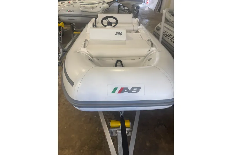 Slide: The Image of 2024 AB Inflatables ABJET 290 inflatable boat on trailer in showroom. - 4
