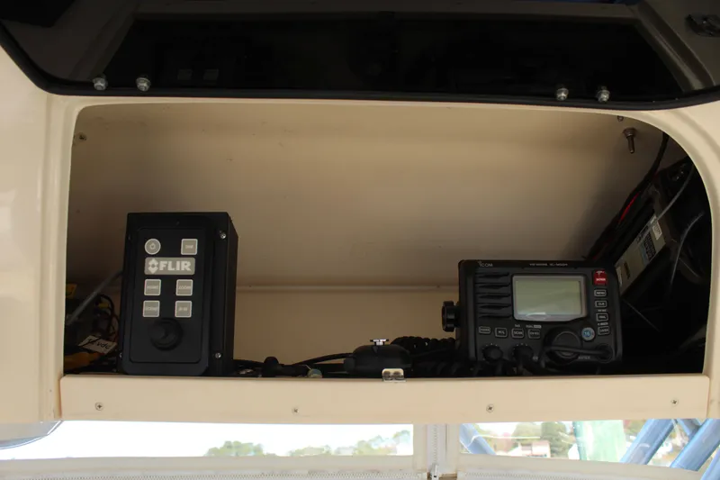 Slide: The Image of 2008 Grady-White Express 330 boat bathroom with sink and toilet. - 25