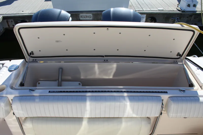 Slide: The Image of 2008 Grady-White Express 330 electronics compartment with FLIR and Icom devices. - 38