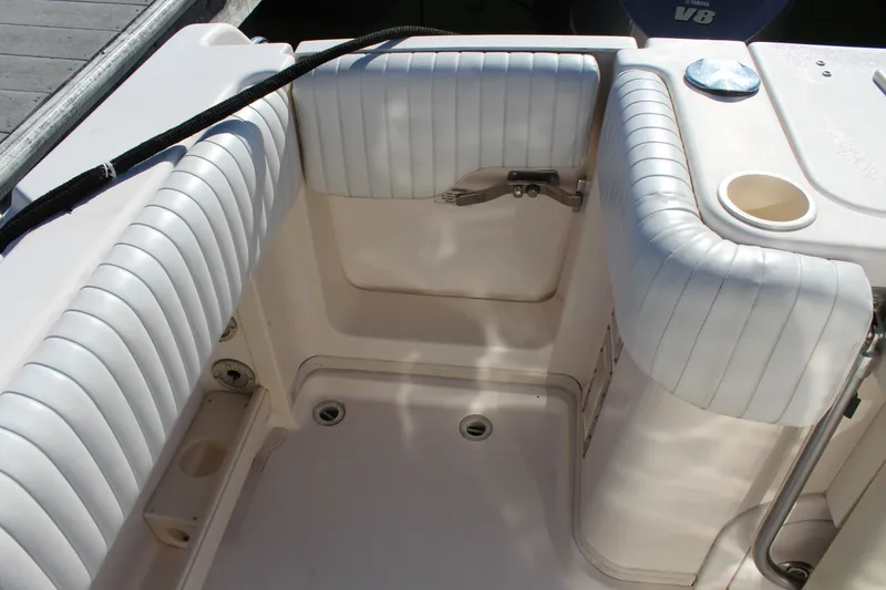 Slide: The Image of 2008 Grady-White Express 330 boat interior with overhead storage and hatch. - 39